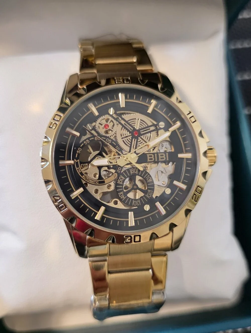 BiBi Gold Tone Skeleton Dial Watch with Black Accents